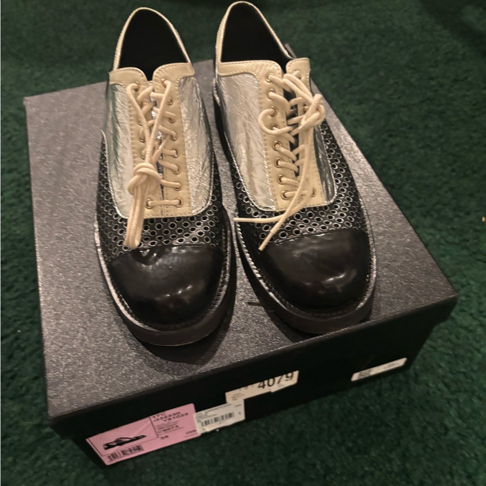 CHANEL Black and Silver Flats